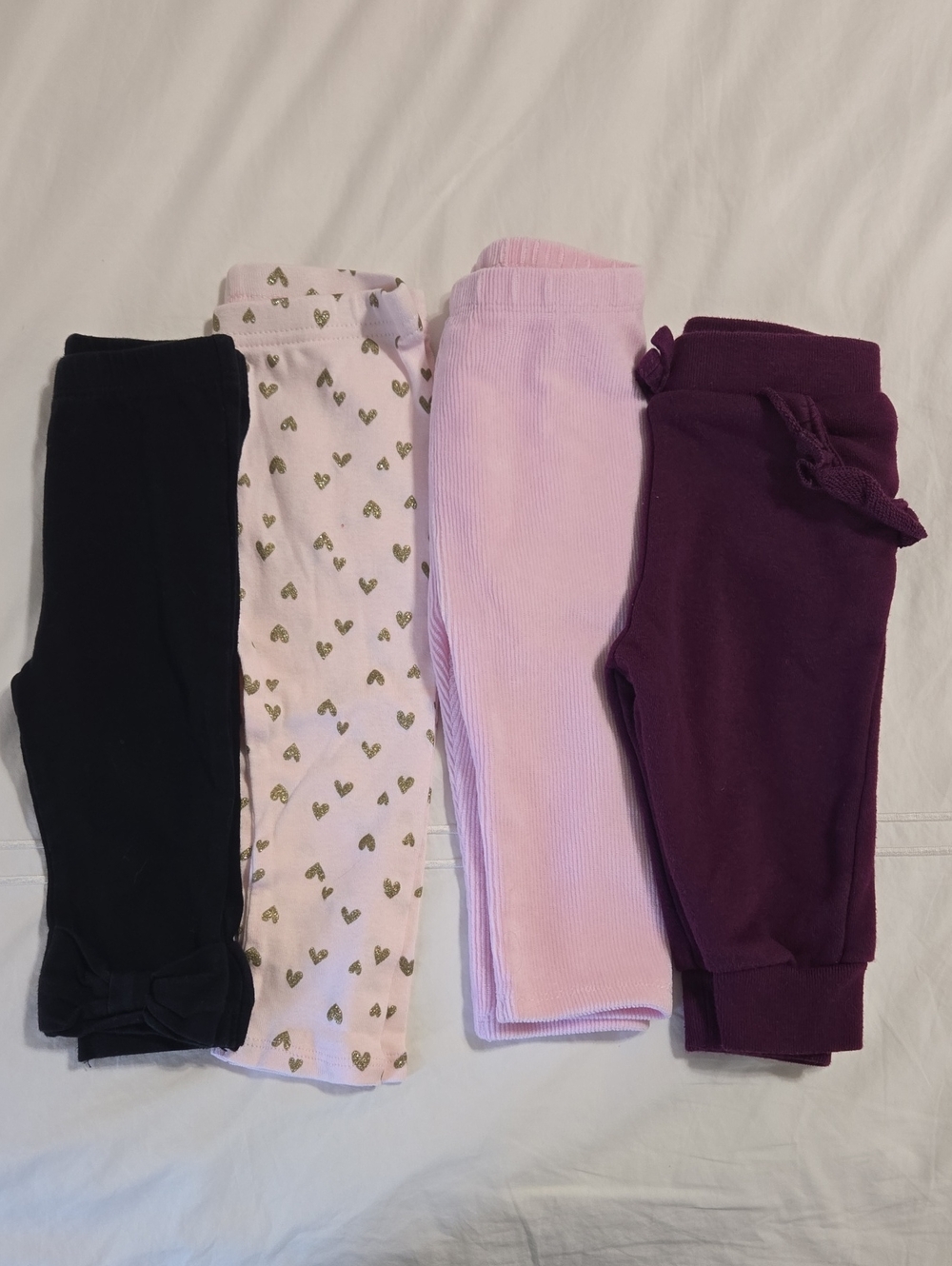 4 pairs of baby girl pants
